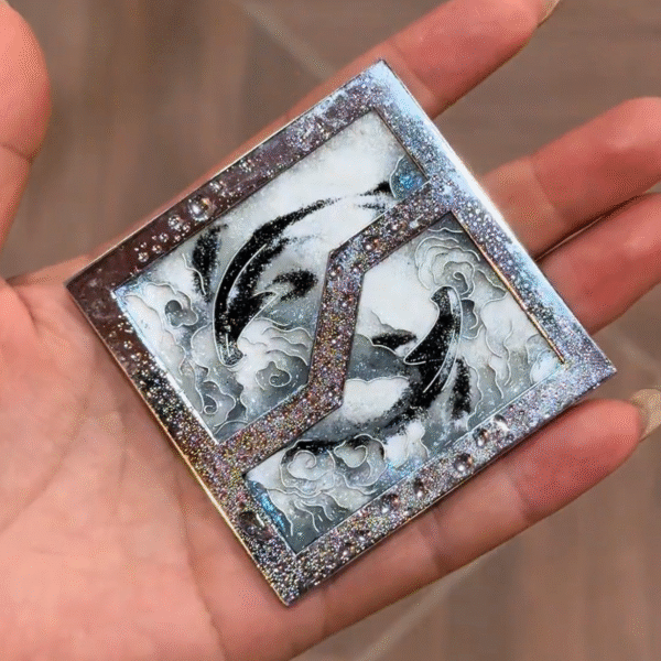 zeekr cloisonné emblem with ink wash yin yang koi
