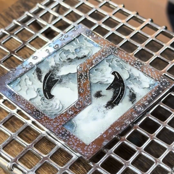 zeekr cloisonné emblem with ink wash yin yang koi