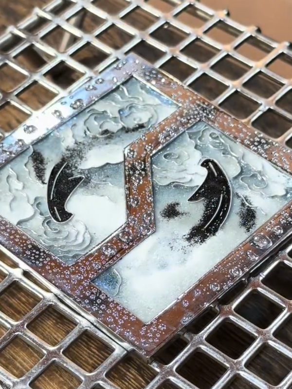 zeekr cloisonné emblem with ink wash yin yang koi