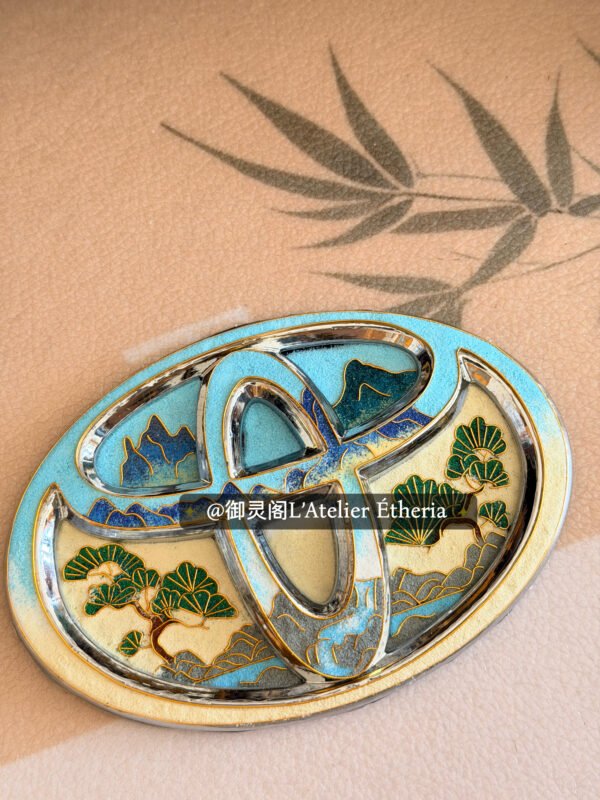 toyota cloisonné emblem with mountain & pine art