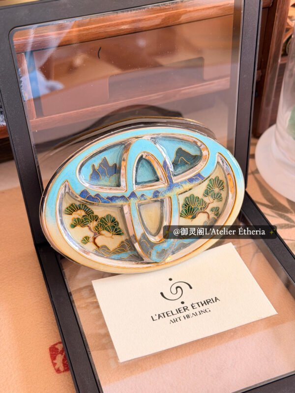 toyota cloisonné emblem with mountain & pine art